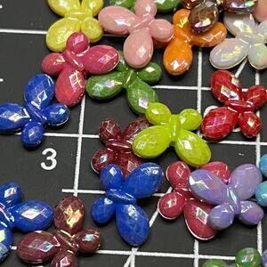 Lot of 54 acrylic iridescent colorful butterfly beads.